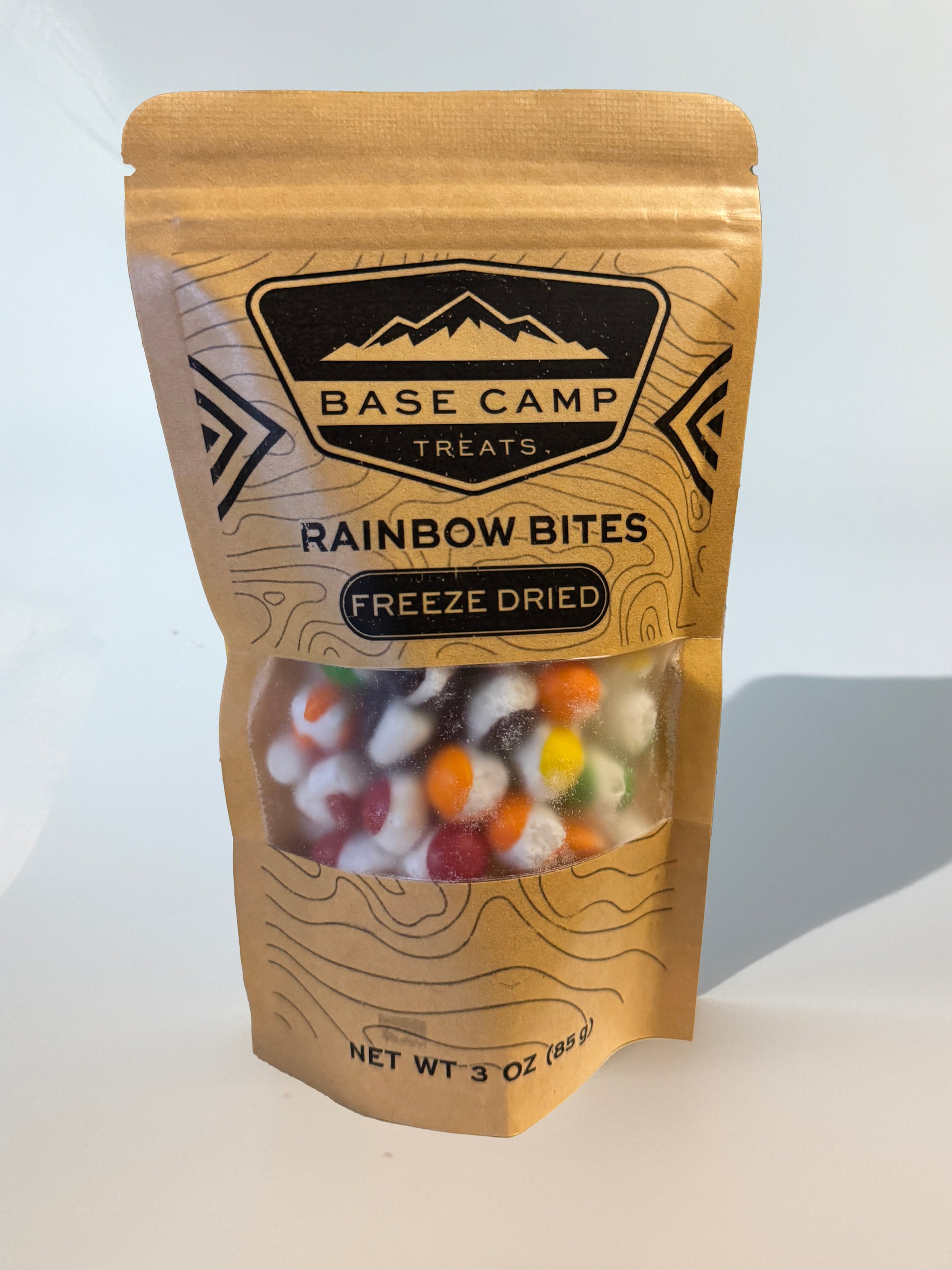 Base Camp Treats Rainbow Bites Freeze Dried Skittles in Kraft package on a white background