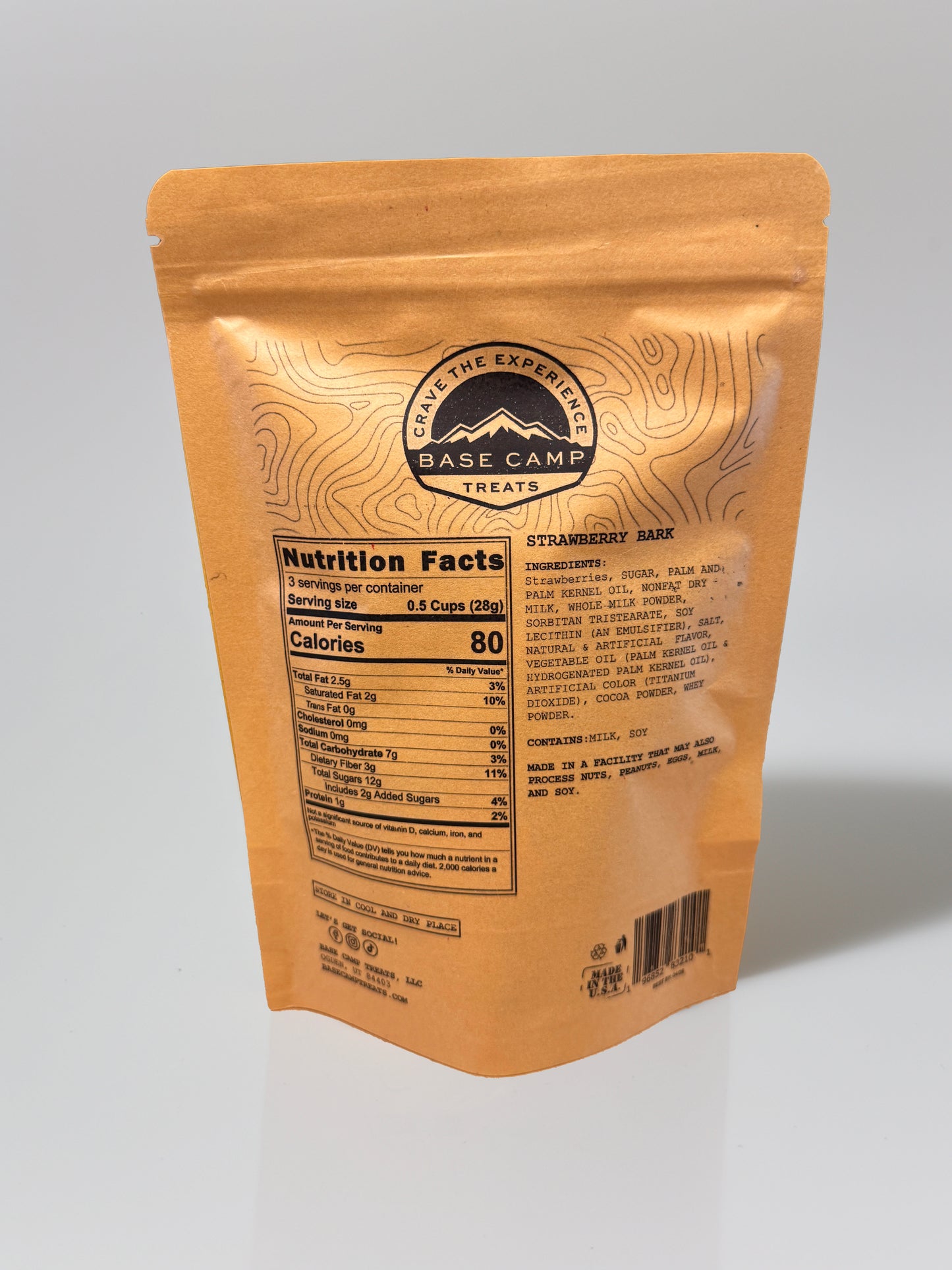 Base Camp Treats Freeze Dried Strawberry Bark in a Kraft bag on a  white background