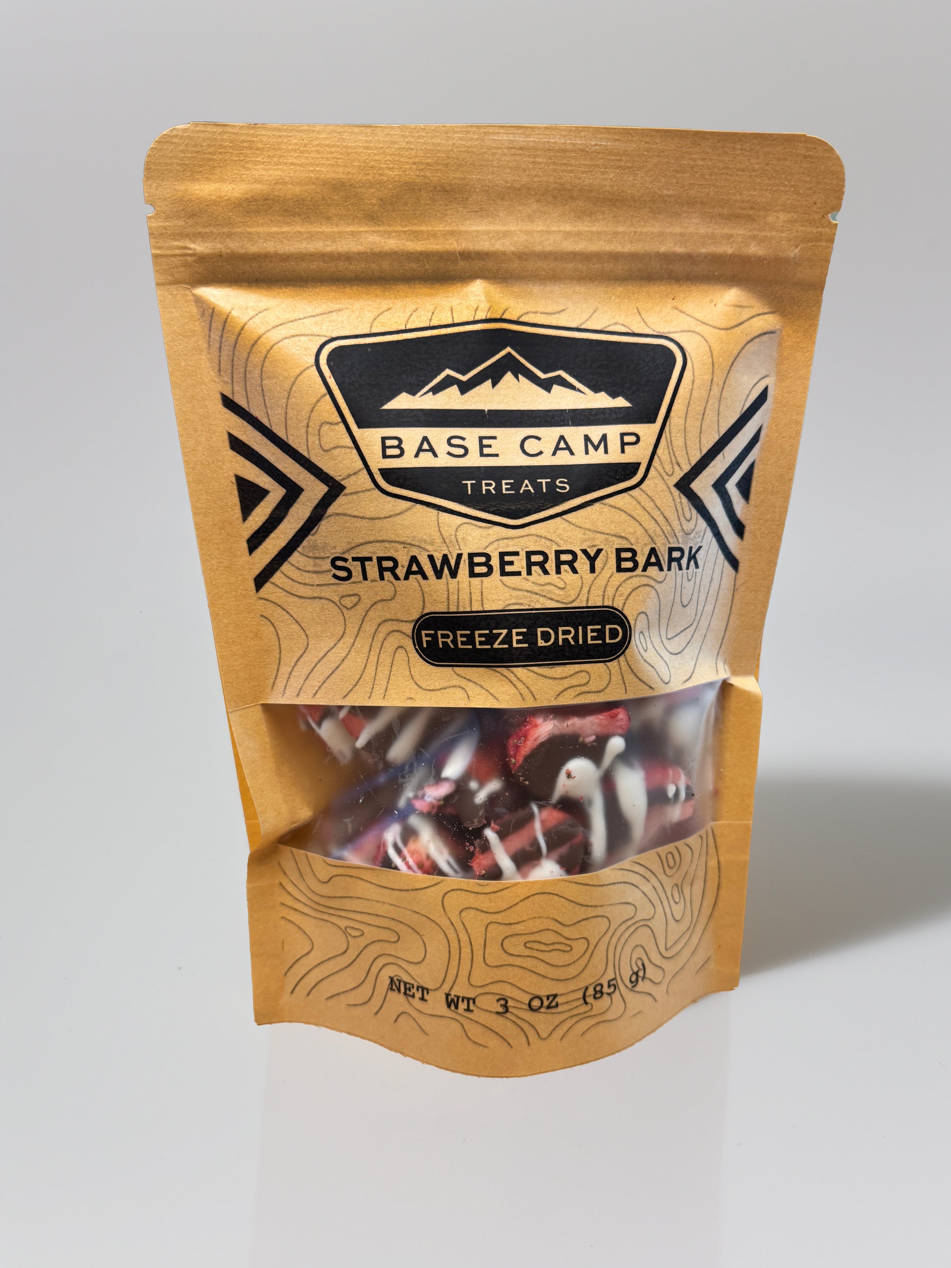 Base Camp Treats Freeze Dried Strawberry Bark in a Kraft Bag on a  white background