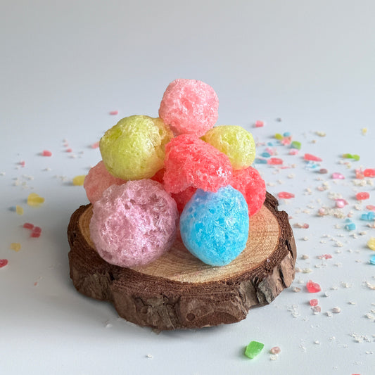 Base Camp Treats Jolly Puffs Freeze Dried Jolly Rancher on a wood disk with a white background