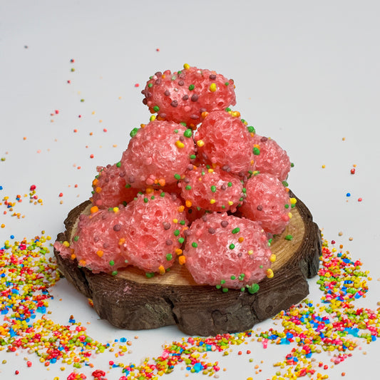 Base Camp Treats Geek Clusters Freeze Dried Nerd Gummy Clusters on a wooden disk with a white background